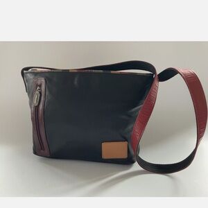 Carlos Falchi large bag for Target. Very good used condition. All zippers work